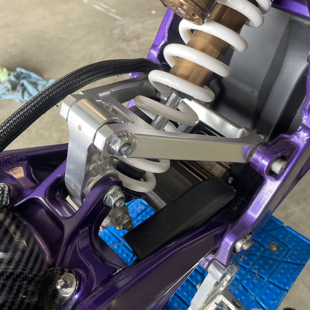 Chrome suspension triangle and linkage for Surron LBX